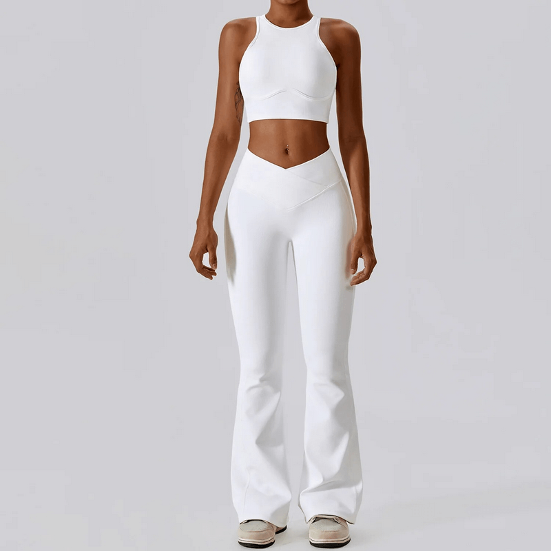 Woman modeling white push-up sports bra and ribbed flare leggings, perfect for active lifestyle. Breathable, quick-dry nylon and spandex.